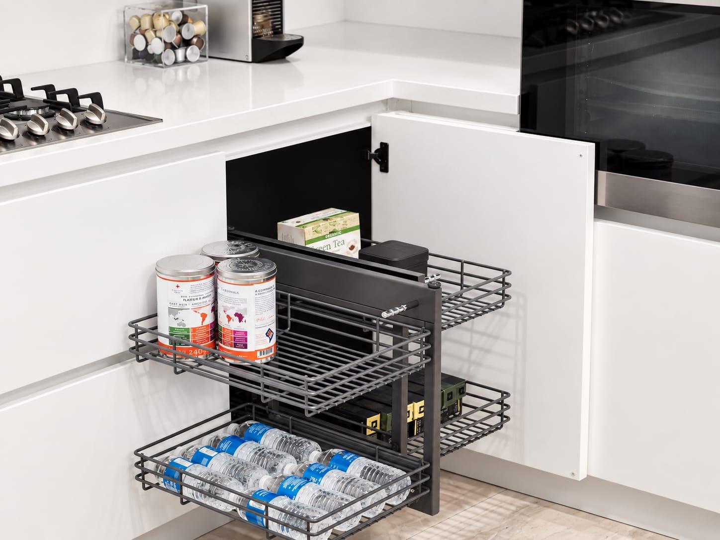 Pull-out corner baskets in a white cabinet