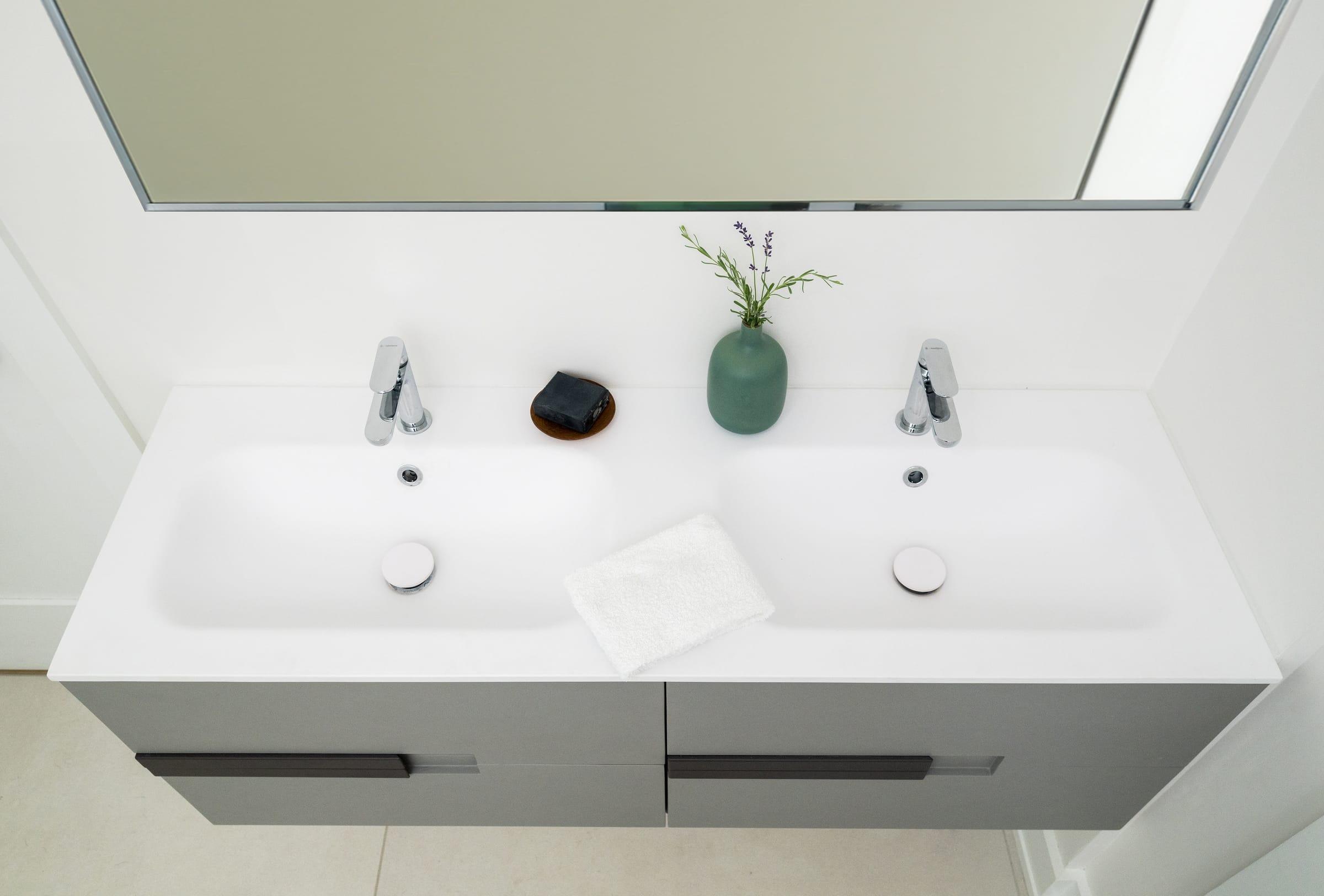 White double basin on a grey vanity