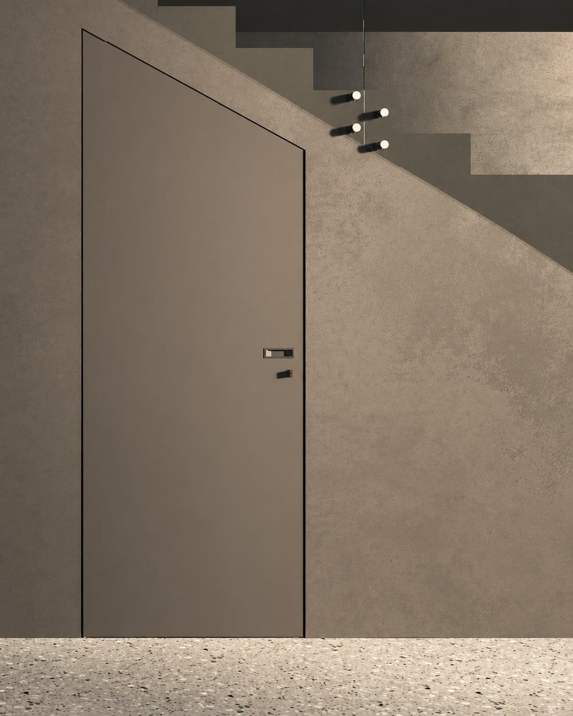 Flush taupe door under a staircase